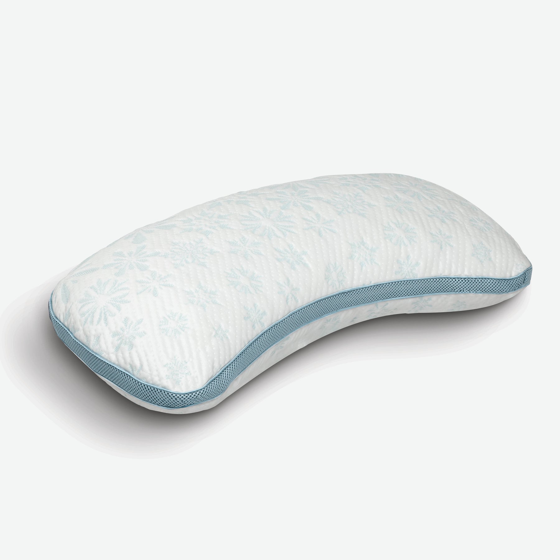 Image of the Cooling Crescent Shredded Foam Pillow showcasing the curved design and snowflake pattern