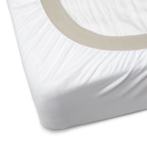 Image of the tan 1" elastic cuff on a Bamboo Mattress Protector on a plain white background