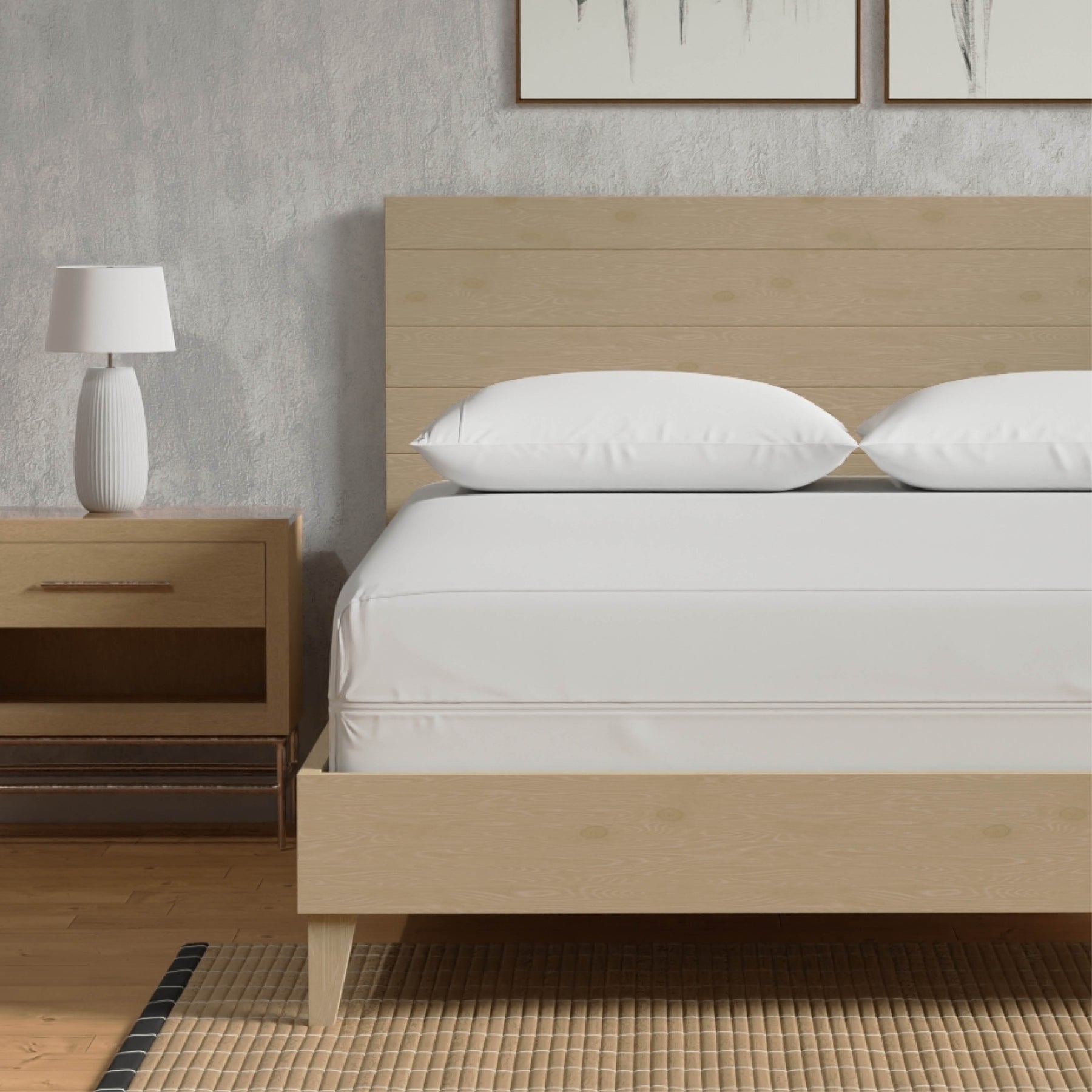 Image of a Bamboo Mattress Protector on a tan bed with two pillows covered with Bamboo Pillow Protectors 