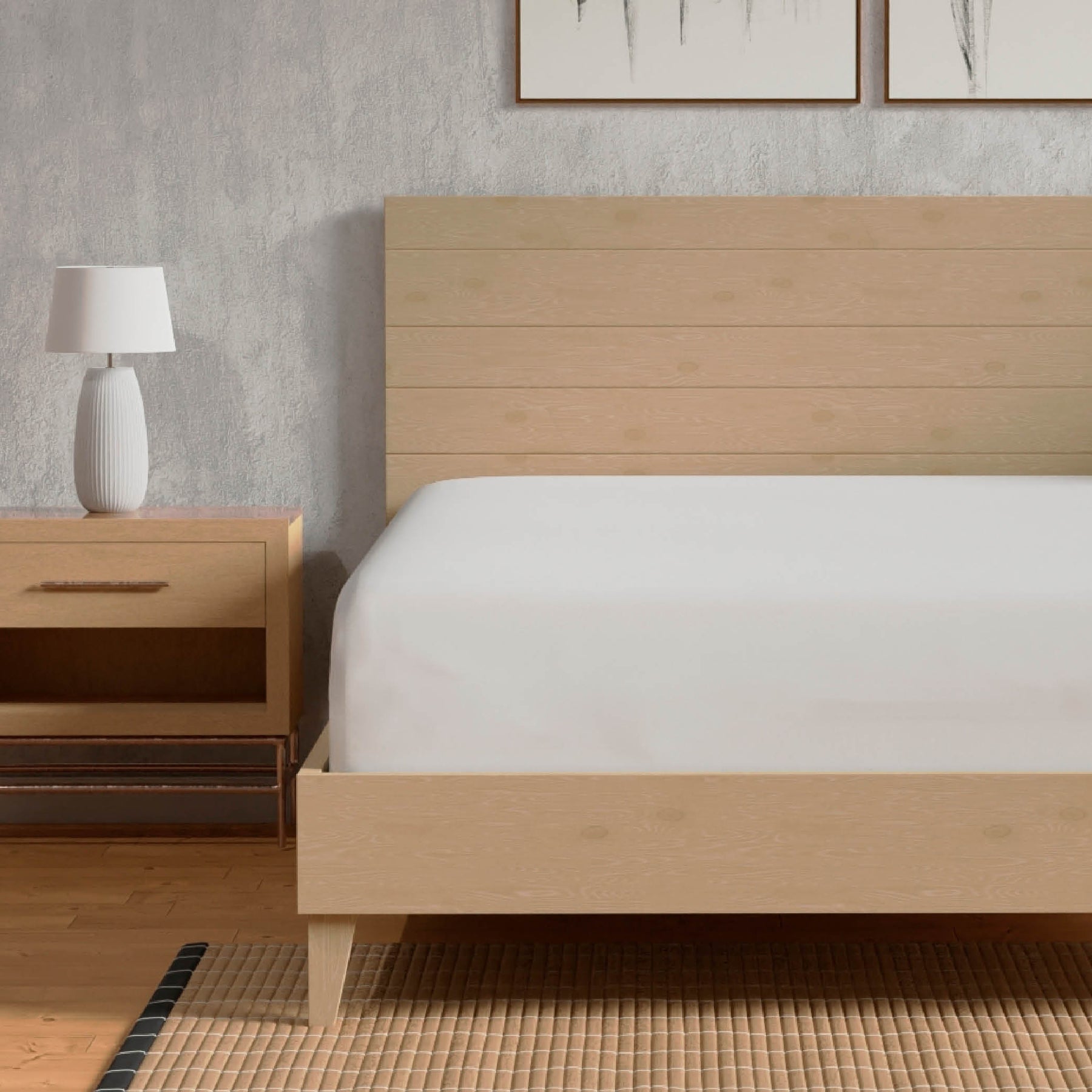 Image of a Bamboo Mattress Protector on a tan bed with two pillows covered with Bamboo Pillow Protectors 