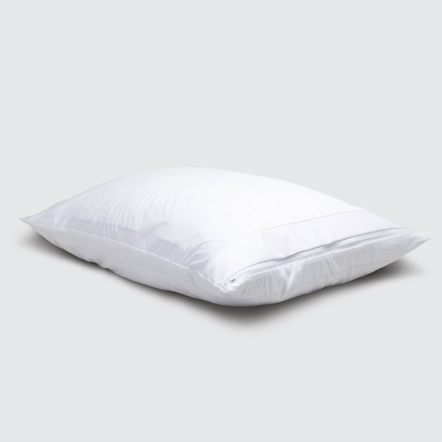 Image of a Bamboo Pillow Protector on a pillow on a plain white background 