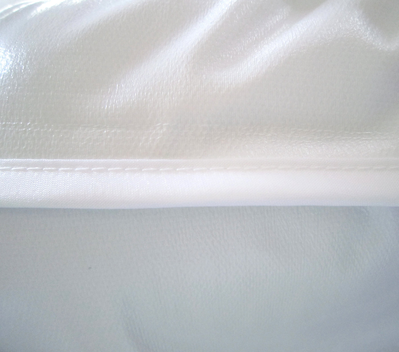 Image showing the inside of a mattress protector with double-bound MiteTight® seams