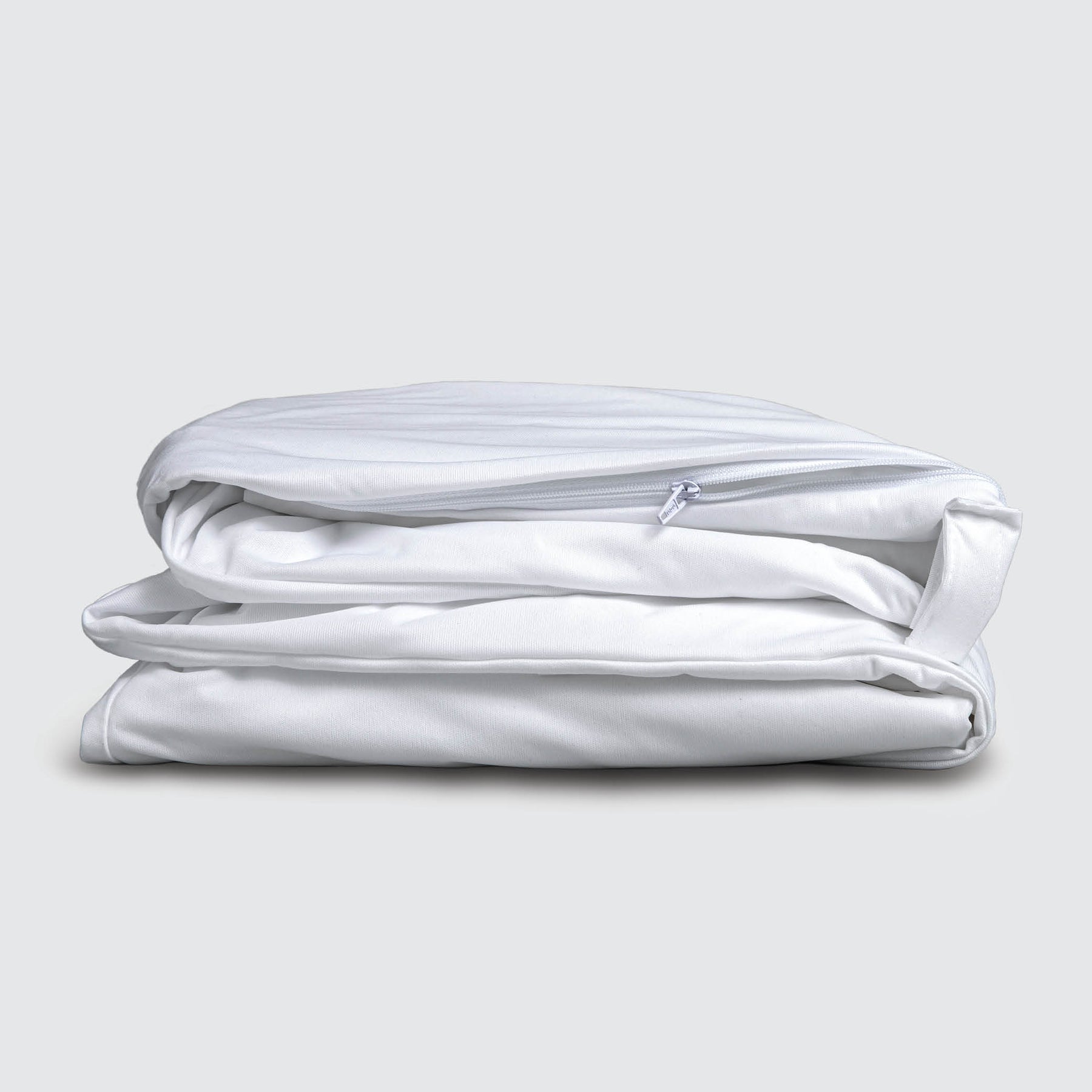 Image of a folded up Refreshing TENCEL™ Lyocell Total Encasement Mattress Protector