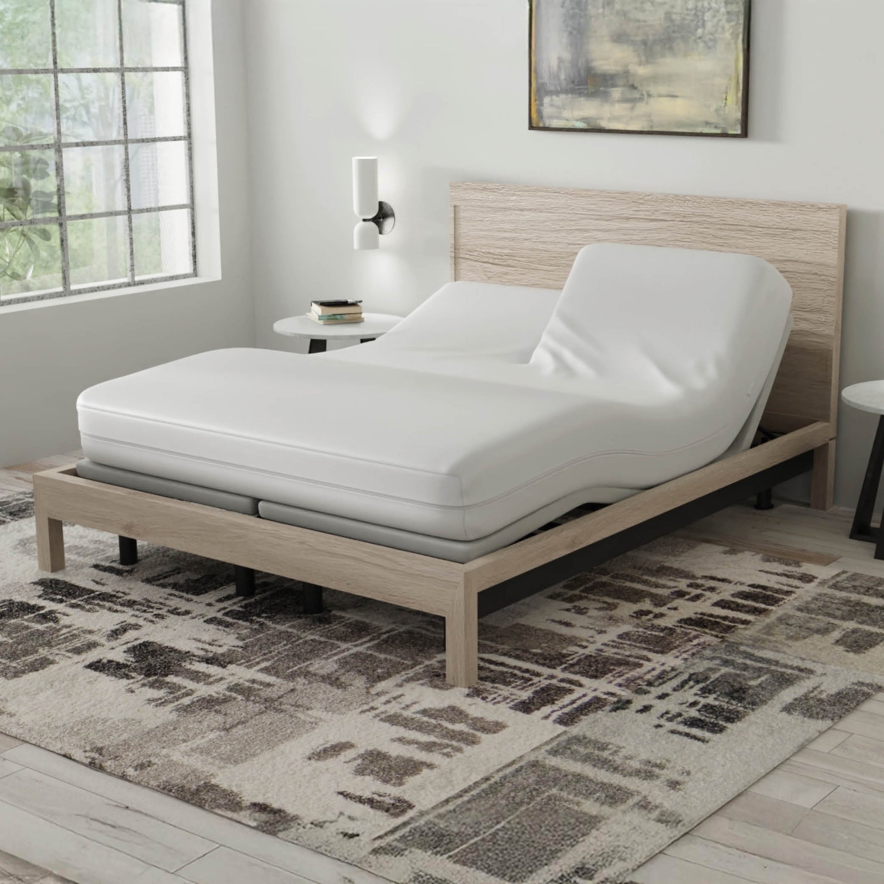 Image of a Refreshing TENCEL™ Lyocell Total Encasement Mattress Protector on a split head adjustable base bed