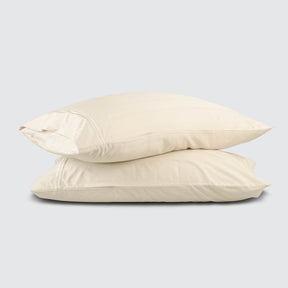 Image of two pillows stacked on top of one another with an Ivory Bamboo Rayon Pillowcase on each