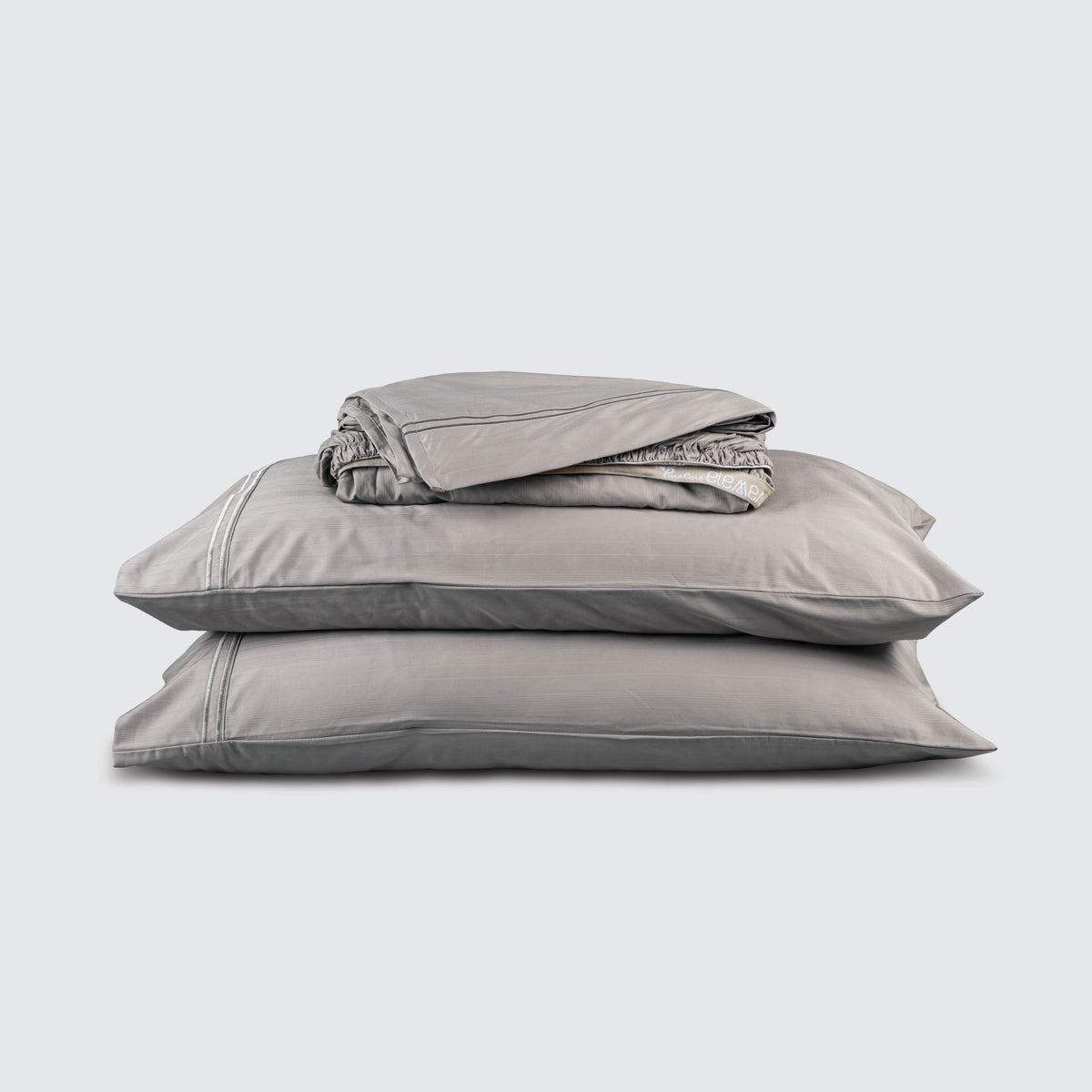 Image of Dove Gray Bamboo Rayon Sheet Set stacked top to bottom: Flat Sheet, Fitted Sheet, 2 Pillowcases