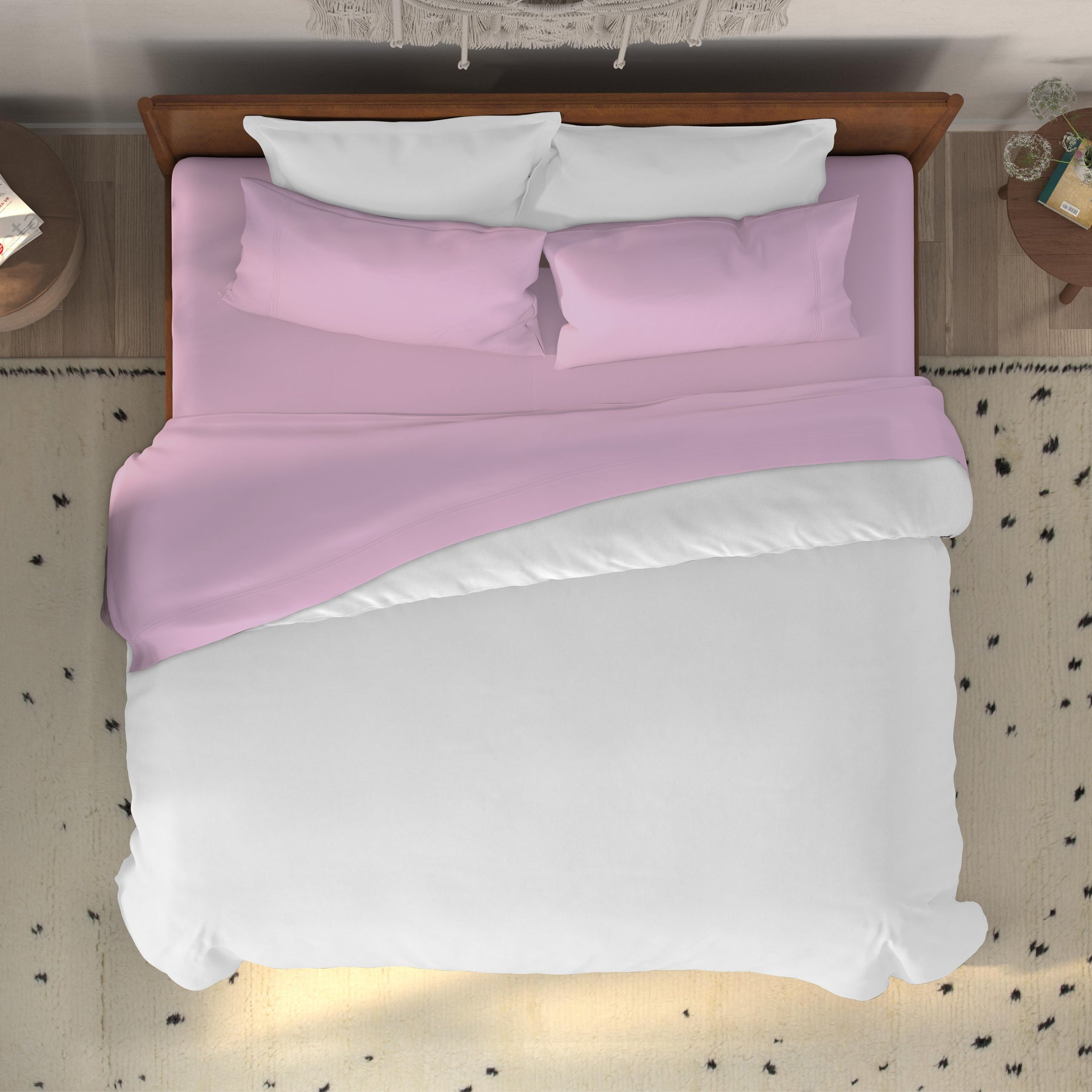 Top-down image of a bed with Lilac Bamboo Rayon Sheets and a white duvet cover