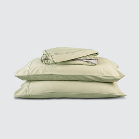 Image of Sage Bamboo Rayon Sheet Set stacked top to bottom: Flat Sheet, Fitted Sheet, 2 Pillowcases