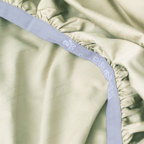 Image showcasing the Precision-Fit® elastic band on the bottom of a Sage Bamboo Rayon fitted sheet