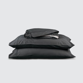 Image of Shadow Bamboo Rayon Sheet Set stacked top to bottom: Flat Sheet, Fitted Sheet, 2 Pillowcases