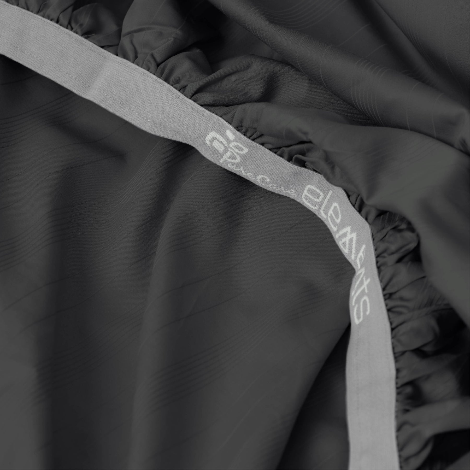 Image showcasing the Precision-Fit® elastic band on the bottom of a Shadow Bamboo Rayon fitted sheet