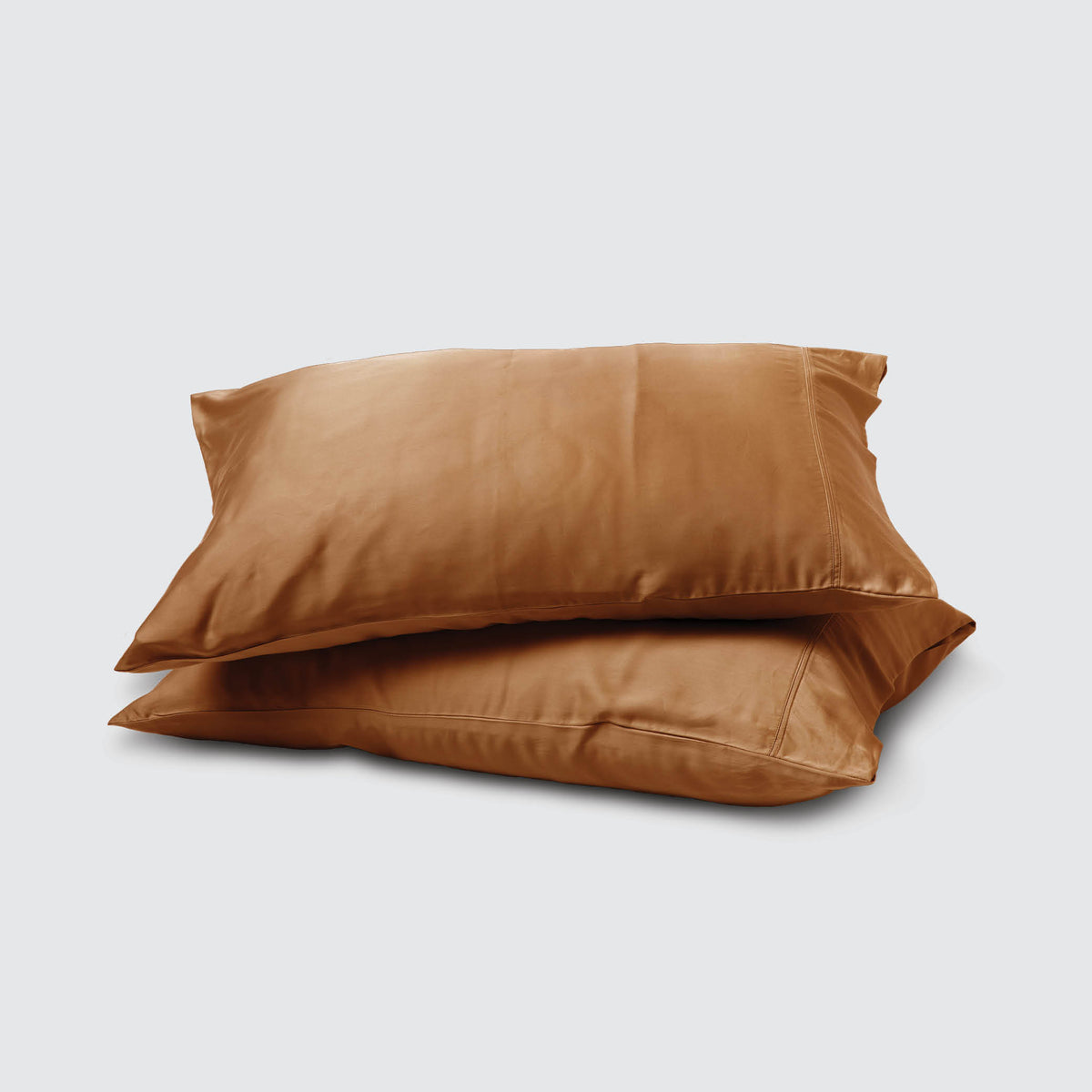 Image of two pillows stacked on top of one another with a Clay Recovery Viscose Pillowcase on each