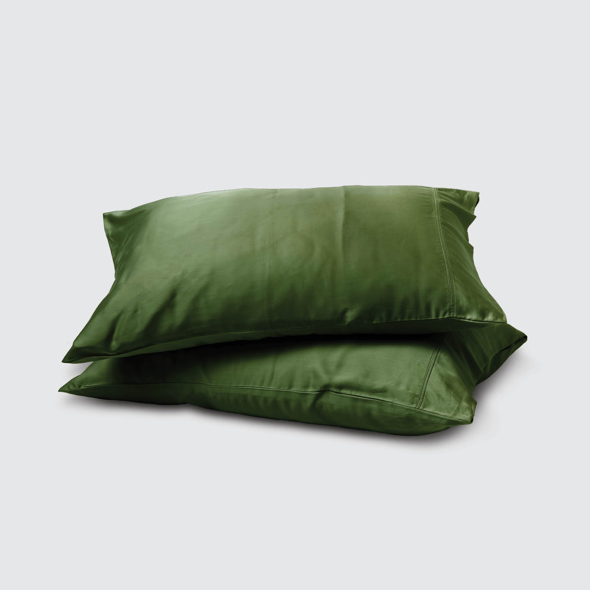 Image of two pillows stacked on top of one another with a Moss Recovery Viscose Pillowcase on each