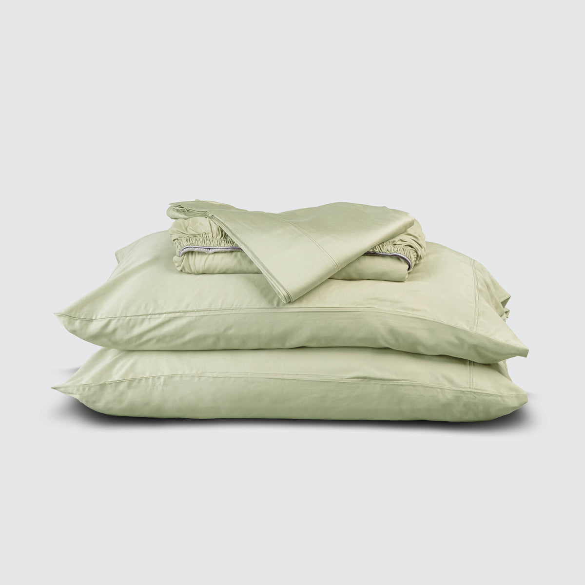 Image of Sage Recovery Viscose Sheet Set stacked top to bottom: Flat Sheet, Fitted Sheet, 2 Pillowcases