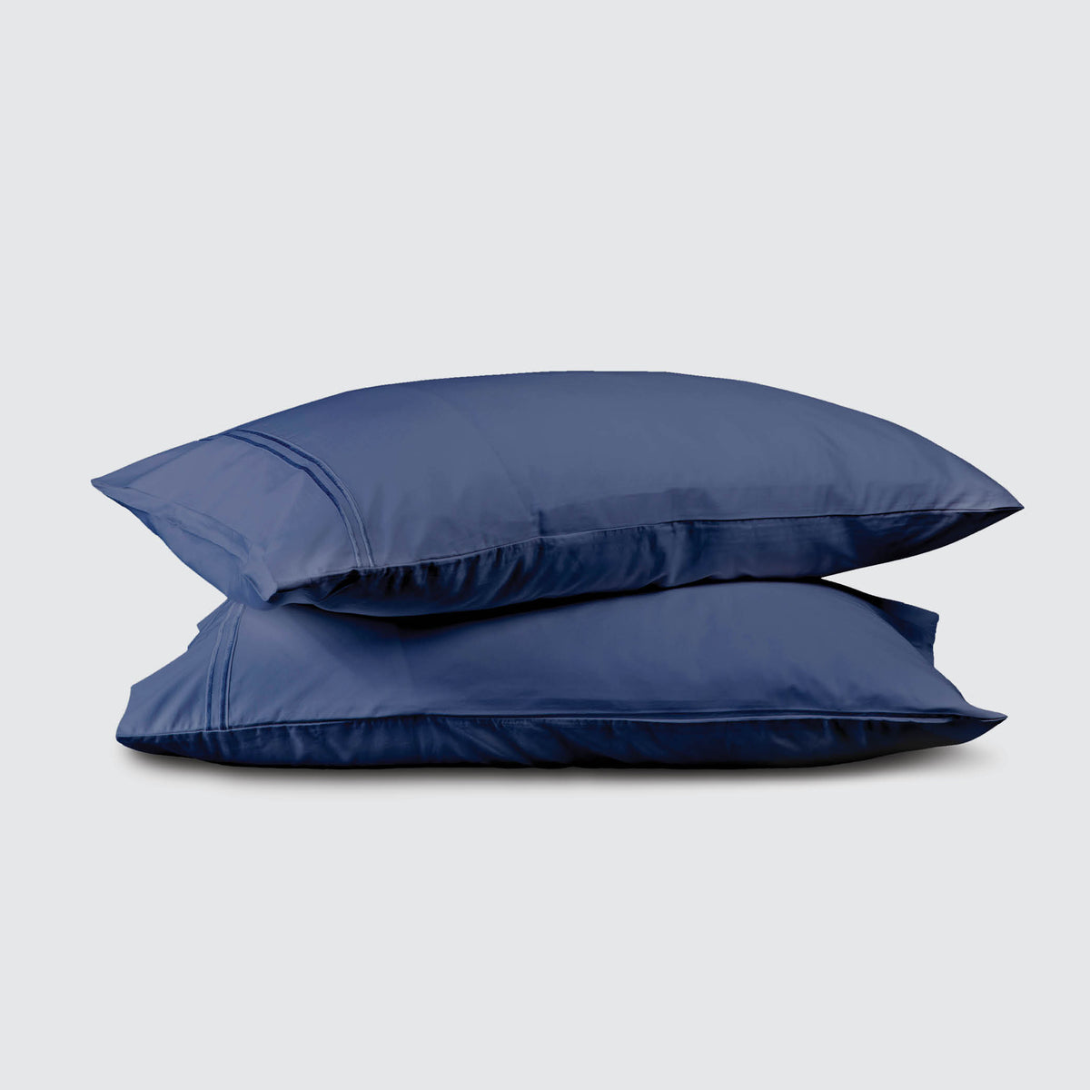 Image of two pillows stacked on top of one another with a Celestial Blue Refreshing TENCEL™ Lyocell Pillowcase on each