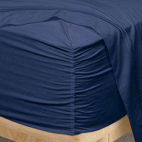 Image of a corner of a Celestial Blue Refreshing TENCEL™ Lyocell fitted sheet showcasing the Precision-Fit® Corner