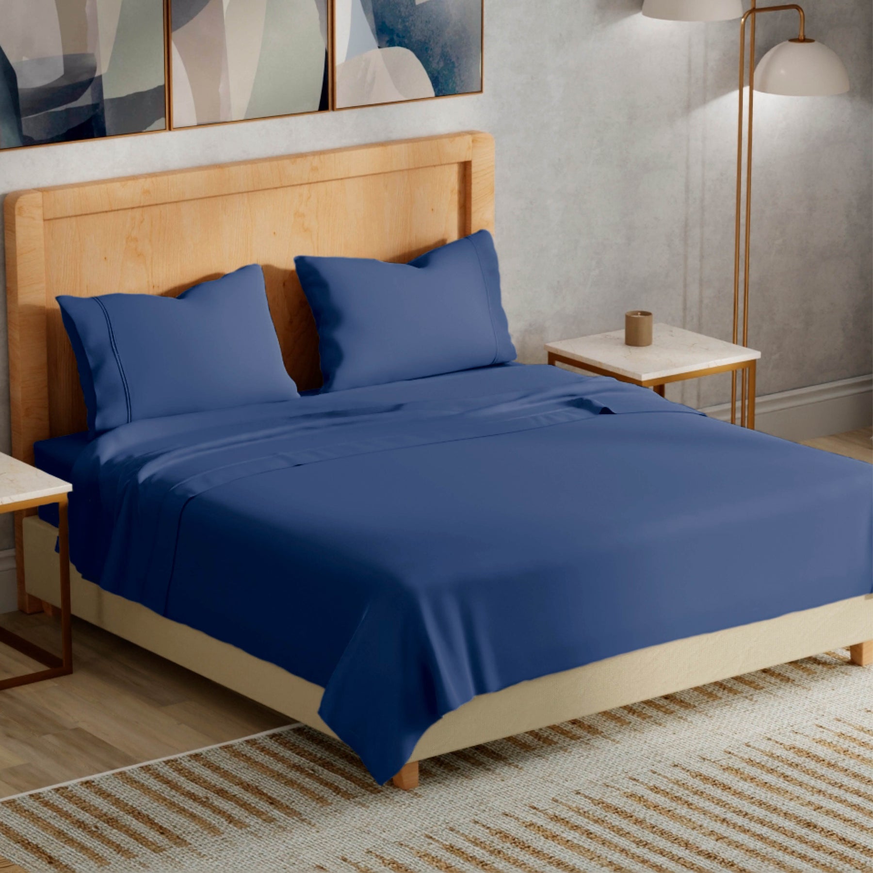 Image of a bedroom with a dressed bed with Celestial Blue Refreshing TENCEL™ Lyocell Sheets 