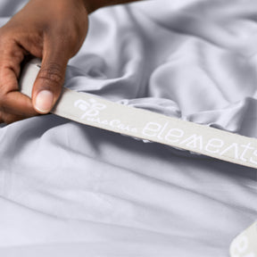 Image showcasing the Precision-Fit® elastic band on the bottom of a Light Blue Refreshing TENCEL™ Lyocell fitted sheet