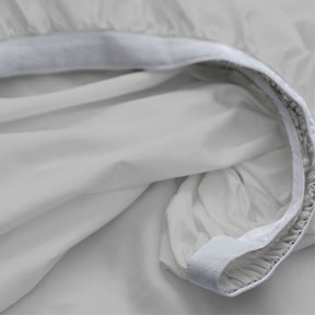 Image showcasing the Precision-Fit® elastic band on the bottom of a Dove Gray Soft Touch TENCEL™ Modal fitted sheet