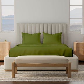 Image of a bedroom with a dressed bed with Moss Soft Touch TENCEL™ Modal Sheets 