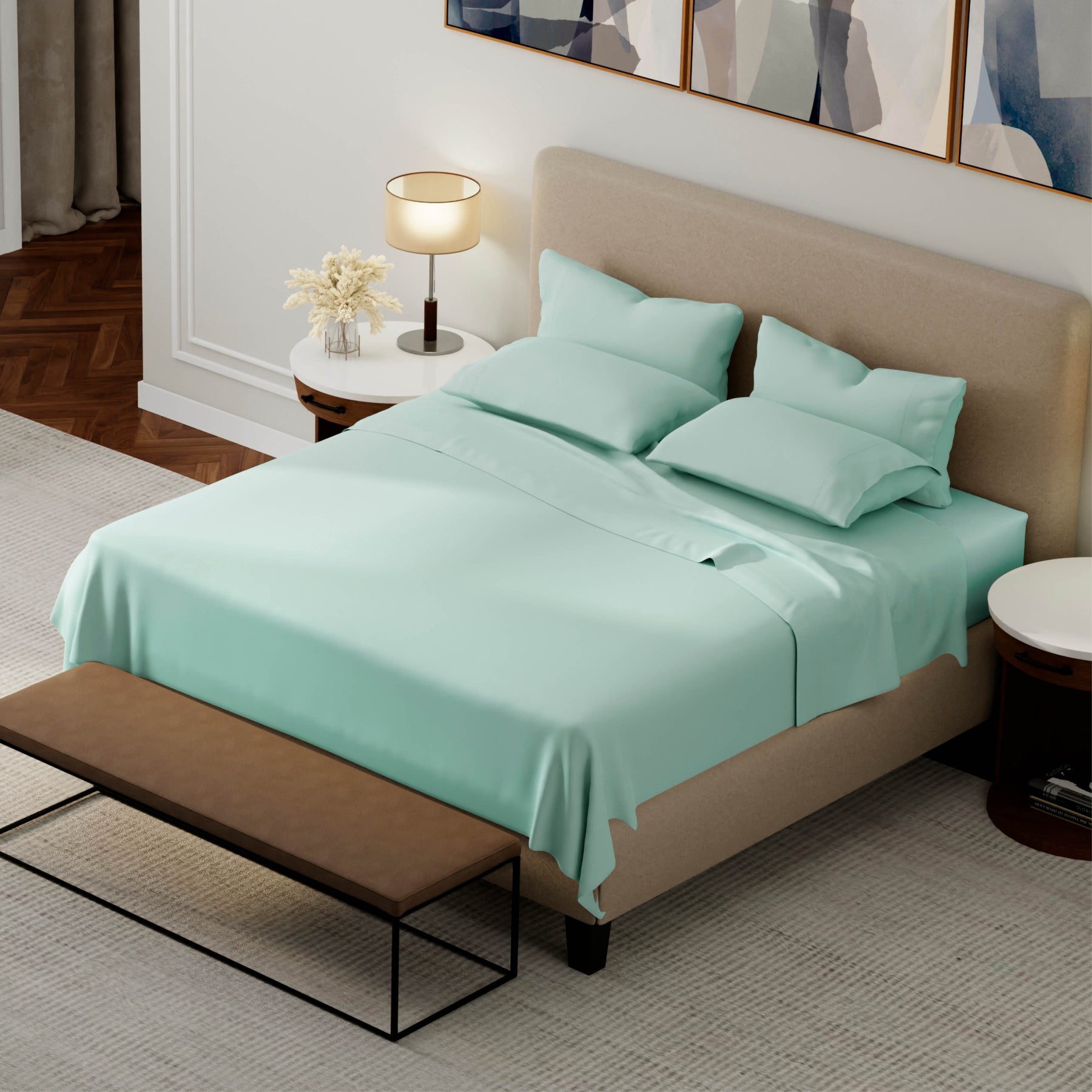 Top-down image of a bedroom with a dressed bed with Seafoam Weightless Cotton Sheets and Pillowcases